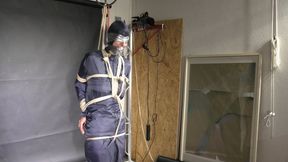 Myxxxy bound and gagged in a shiny nylon Rainsuit