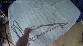 Topless barefoot Gladys in jeans shorts is being tied with her hands in reverse prayer, hogtied and gagged - on-screen, POV camera (HD MOV)