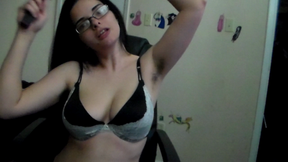Showing hairy armpits while brushing