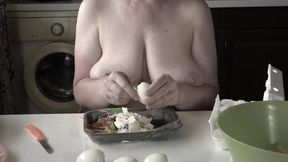 Mature housewife BBW MILF in the kitchen with naked big saggy tits.