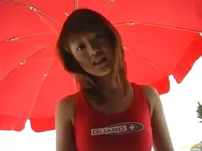 Seductive Asian Lifeguard Performs Oral CPR Right On The Sandy Shoreline