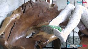 ”Hot blonde shows off her cute feet wearing stockings”