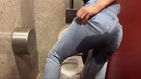 Piss in jeans in public toilet