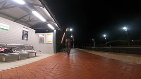 Publicly exposed sissy muscle slut at train station