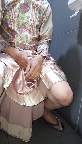 Crossdresser masturbating wearing satin set
