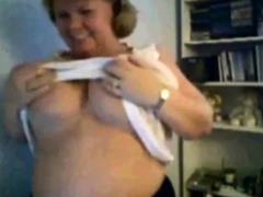 Mature Nancy playing with her boobs on webcam