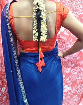 Indian Housewife in the bluesaree enjoying