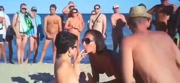 Great public orgy at the beach of Spain