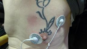 Estim with patches on tits
