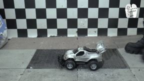 RC Car under Christins cruel combat Boots