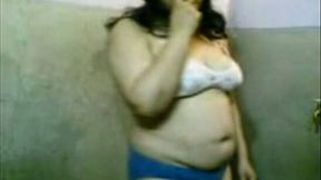 Indian amateur BBW lady in the bathroom stripping on cam