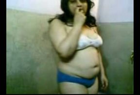 Indian amateur BBW lady in the bathroom stripping on cam