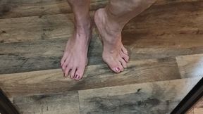 OIled calves in the mirror