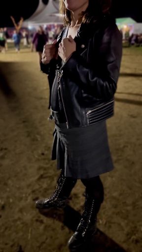 Woman in leather jacket at night