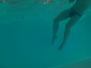 Underwater swimming with jockstrap in hotel pool