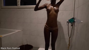 Dolcina is sexy as hell showering her perfect skinny African body