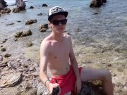 Russian teen walks on the beach and shows his cock in public, but he was seen