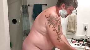 Dad bod shaving face and crotch