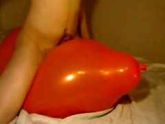 Big inflatable orange balloon humping cum