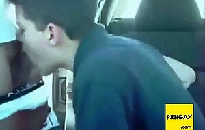 Sucking a cock seated in his car