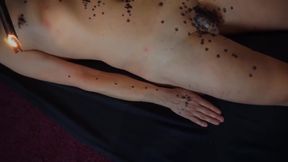 Mistress punishing his cock and body witn a wax