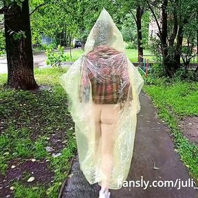 Girl in a raincoat flashing tits and ass on the city streets