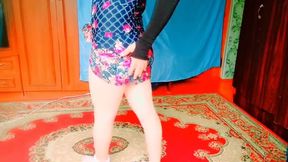 Sweet shemale dancing under string lights in backyard