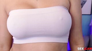 She with big tits masturbates on the chair