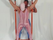 spandex covered slave and his muscle master