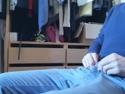 Jerking off sitting on a chair in a dressing room
