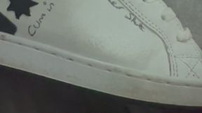 Doodling rude on sneakers, very naughty