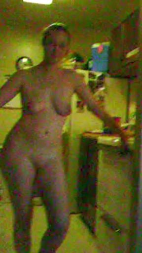 Curvy blonde housewife poses in vintage attire for a smoking hot solo