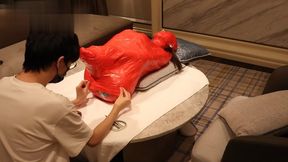 GG80-A cute Asian girl with pigtails was completely wrapped in tape.