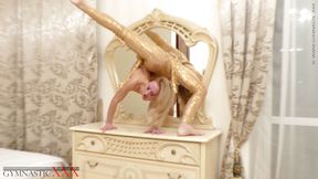 Ballerina in a golden dress