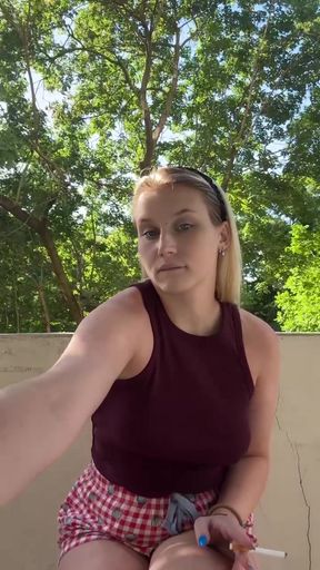 Amateur with big tits smokes on her OnlyFans page