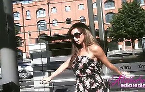 Sexy Shemale Alessandra Blonde showing off her legs on the street.