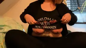 MILF with big tits reads fan fiction in glasses