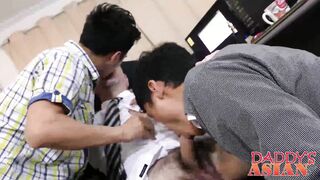 Daddy sucking and fucking two Asian twinks in the office