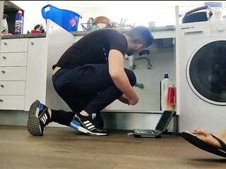 Sexually excited wife screws handyman below the sink