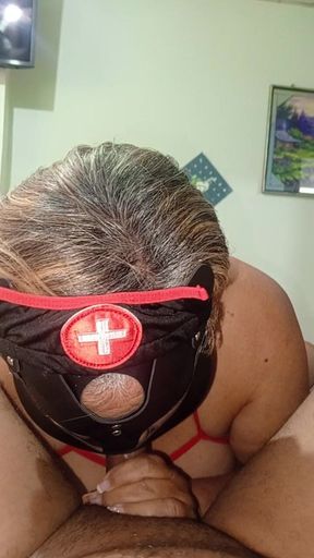 Mature Nurse Giving a Good Cock Blowjob
