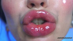 intimate close-up clear lipgloss spitting kiss