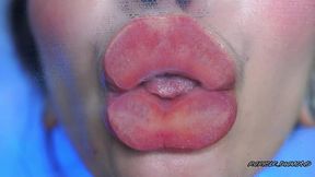 intimate close-up clear lipgloss spitting kiss