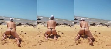 Hot gay beach femboy gets caught in tiny panties by voyeur