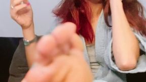 Sexy smoking milf... I'll just let you kneel in front of me, and be enveloped in my smoke, my feet will be presented in front of your face