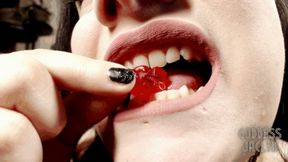 Slicing and chomping up gummy bears WMV
