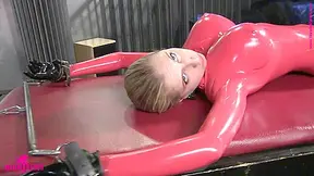 Tied Up In A Tight Red Latex Catsuit