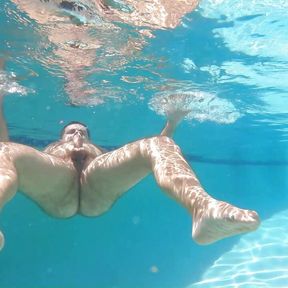 Hairy man frolics and cums underwater!