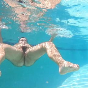 Hairy man frolics and cums underwater!