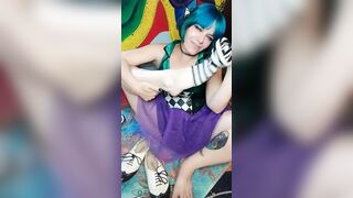 Elf chick takes off shoes and thigh highs