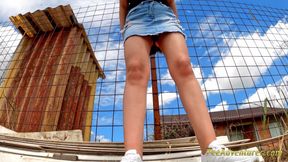 Sexy brunette trying hard to pee